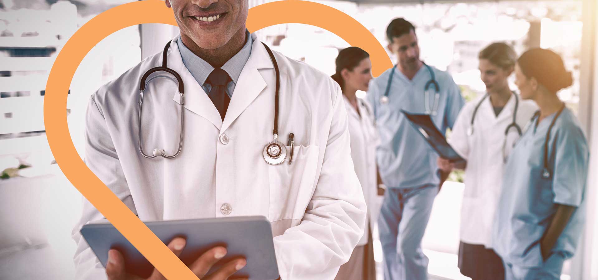 smiling-doctor-holding-digital-tablet-front-heart